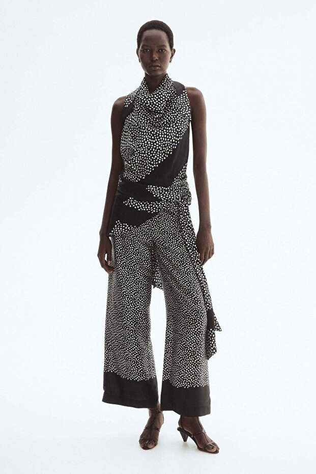 Skirt-layered trousers
