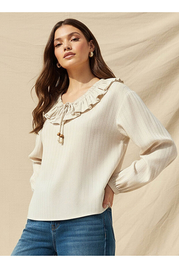 RUFFLE TIE FRONT BLOUSE WITH LONG SLEEVES