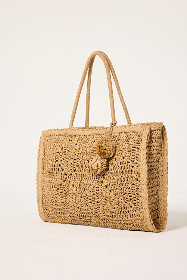 حقيبة بمقبض من الخوص