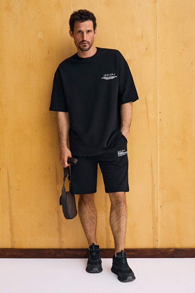 Saito men's organic cotton crew neck black top and bottom set with print detail