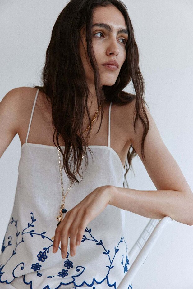 Embroidered linen-blend top