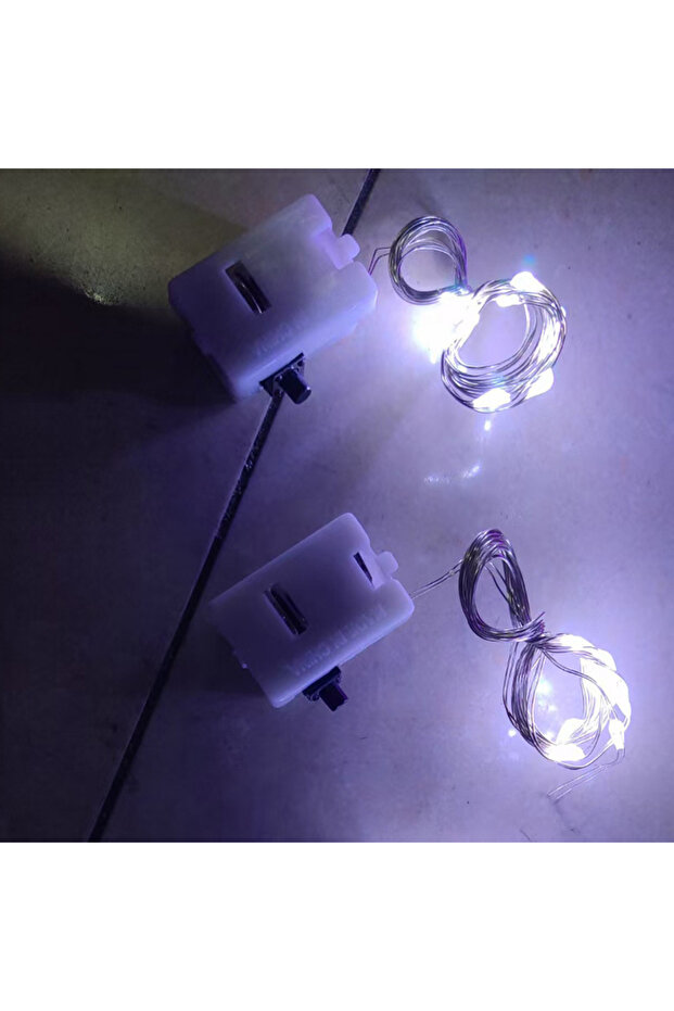 مجموعة من 15 مصباح LED أبيض، 3 أوضاع إضاءة، أسلاك فضية، تعمل ببطارية زر.