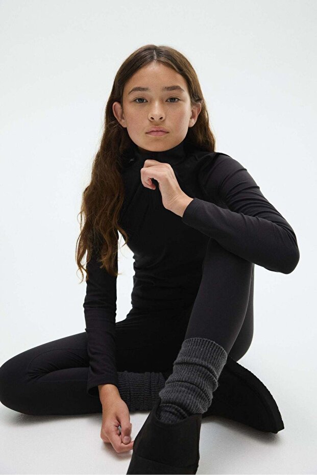 Fleece-lined sports top with SoftMove™