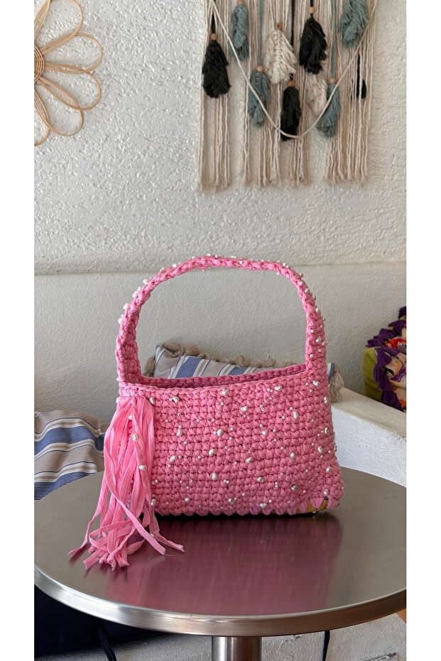Pembe kol çantası