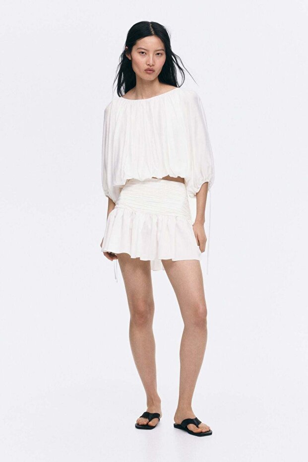 Ruched-waist mini skirt