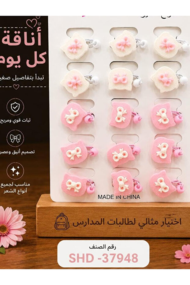 مجموعة دبابيس شعر لطيفة تتميز بتصميم فيونكات صغيرة باللون الوردي ( درزن )