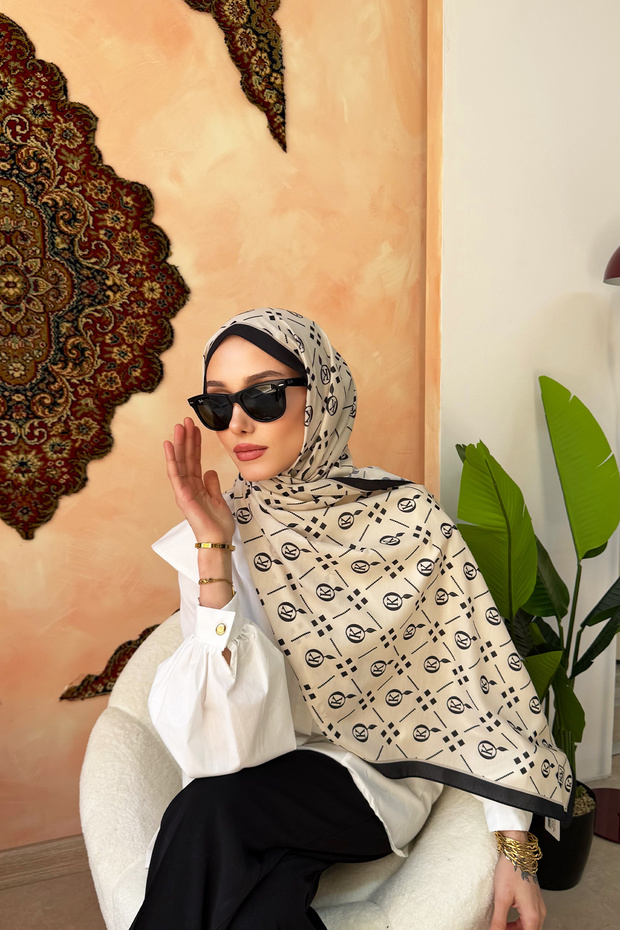 شال ناعم منقوش بلون أكوا من داما كي