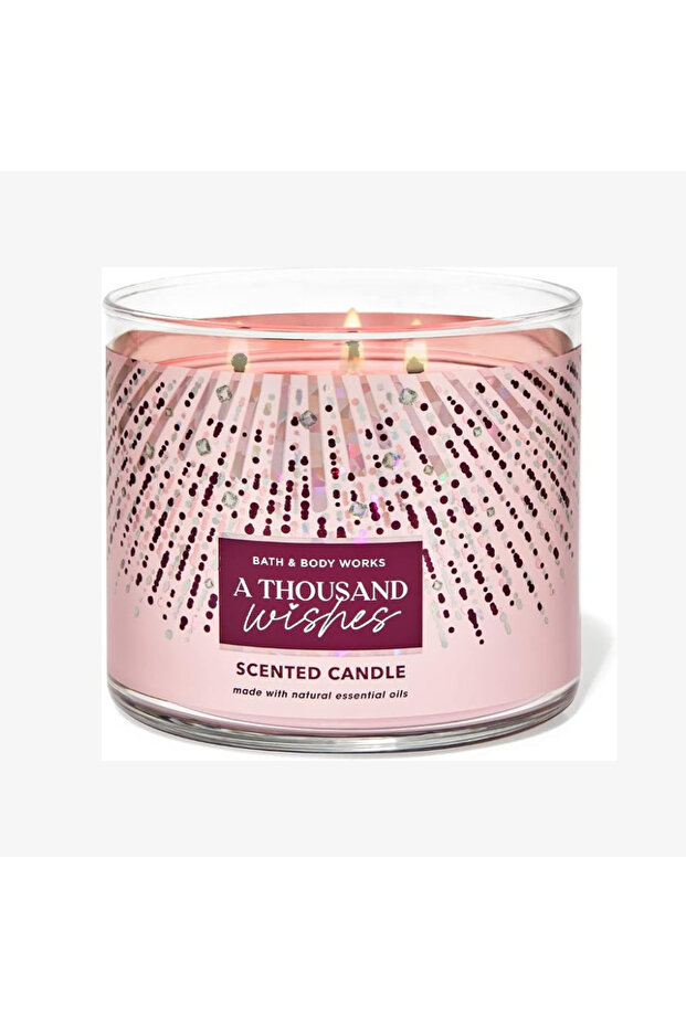 شمعة معطرة بعطر ألف أمنيات