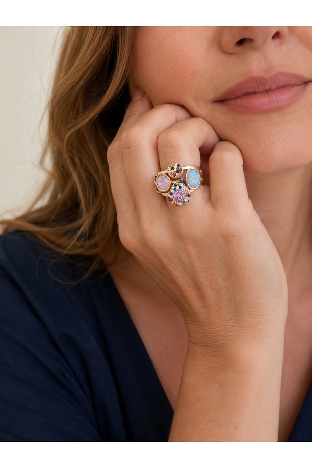 Adjustable stylish gift ring with pink and blue colored stones.