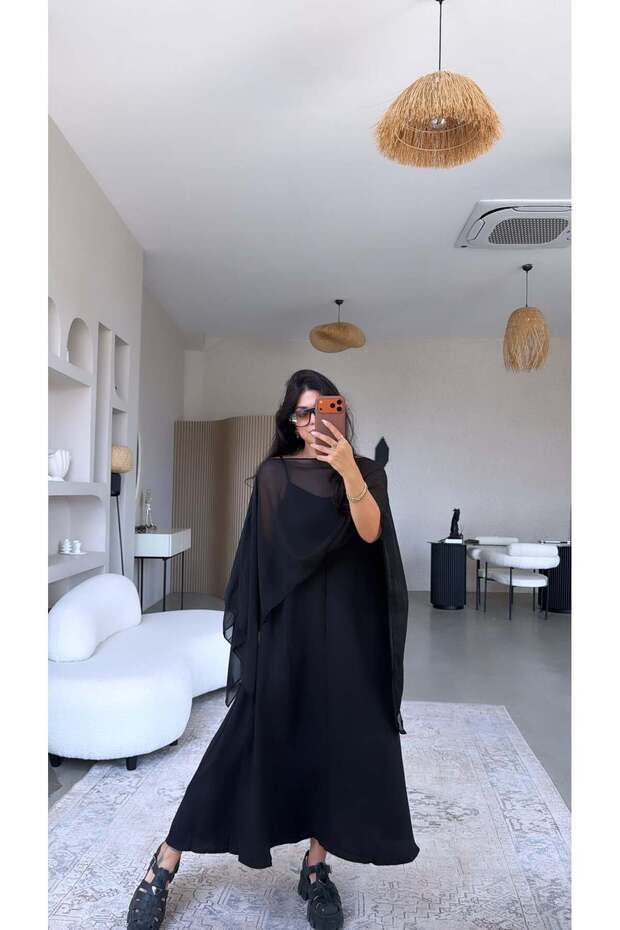 فستان أسود من قماش البانشول والتنسل