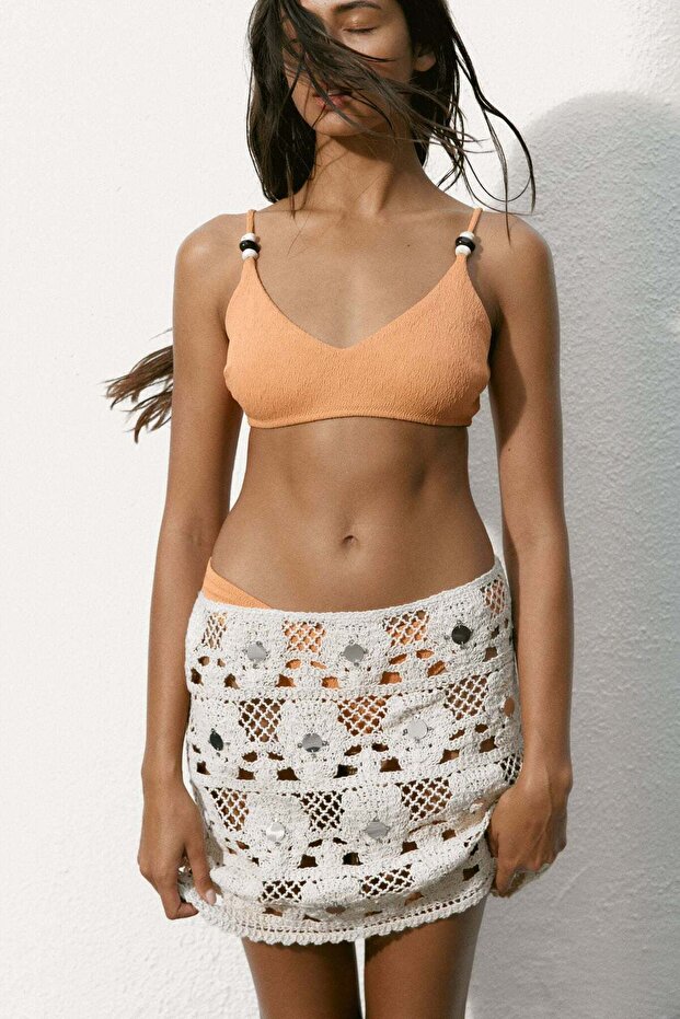 Embellished crochet-look beach skirt