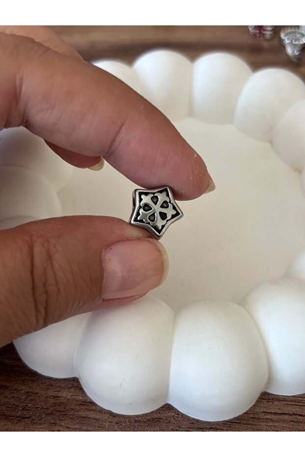 Çelik charm