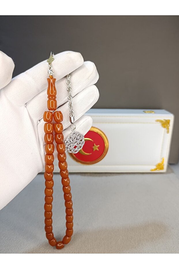 Sikma Amber Prayers Beads Takes on Color When Pulled