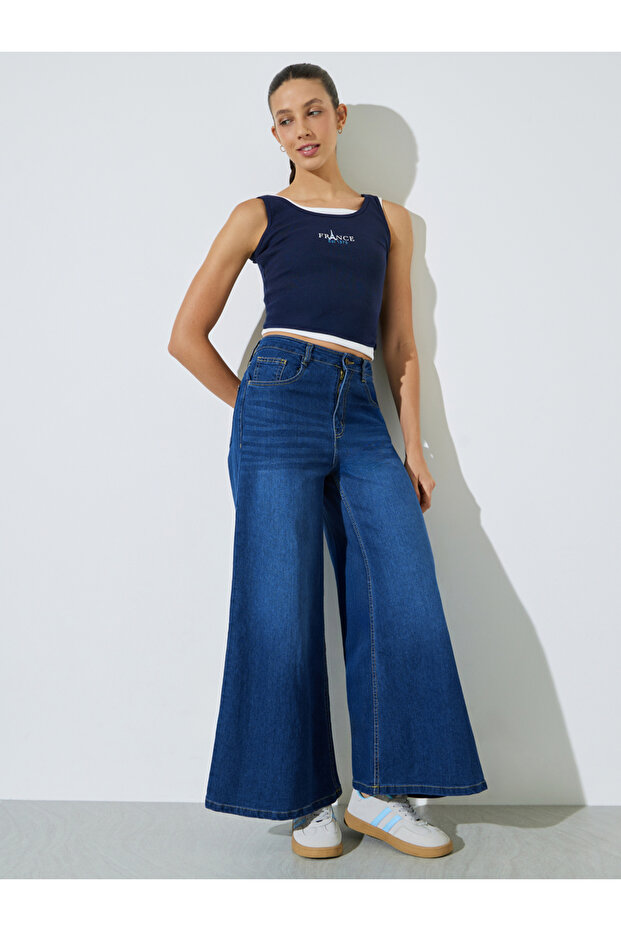 Medium Blue Mid-Rise Flared Leg Jeans
