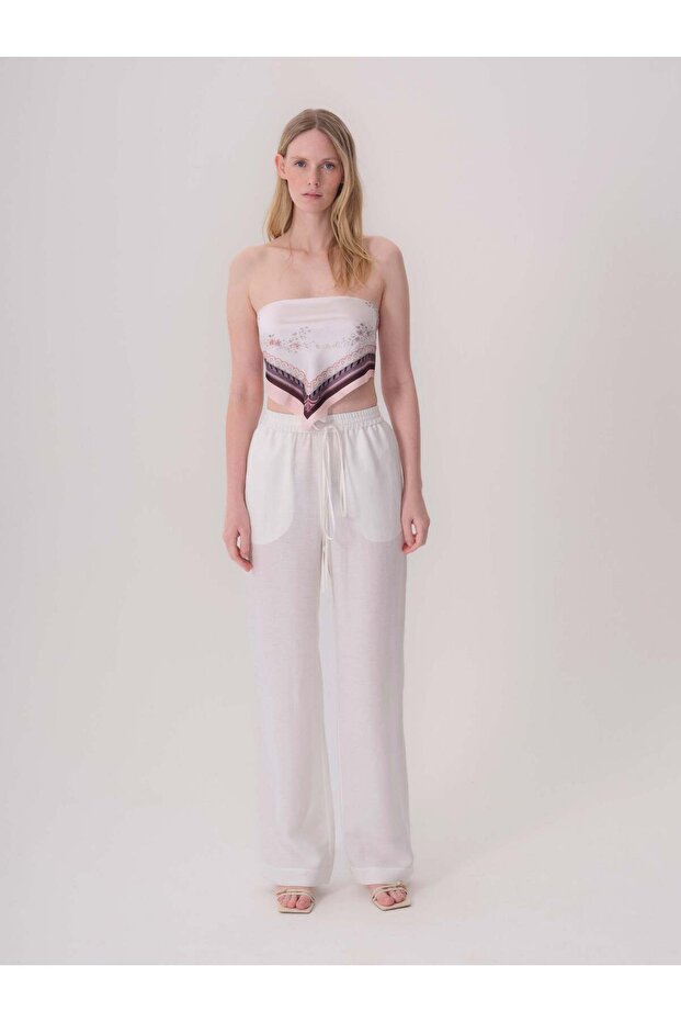 Elastic white linen trousers