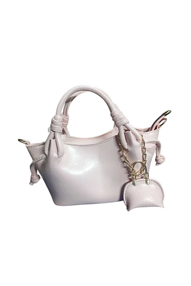 Great Little Pudra with Both Hand-Held and Long-Strap Options