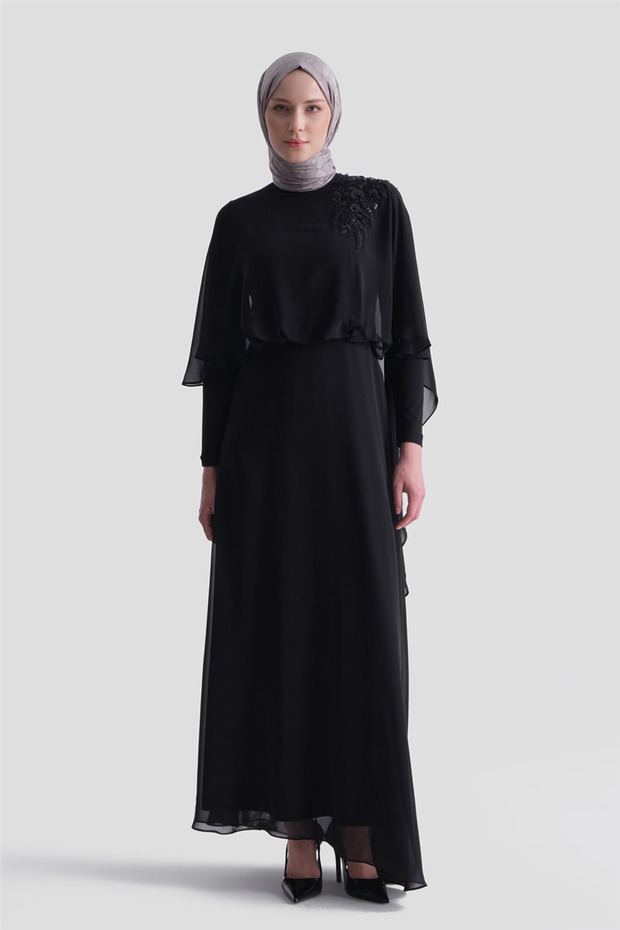 Elegant black dress with necklace detail