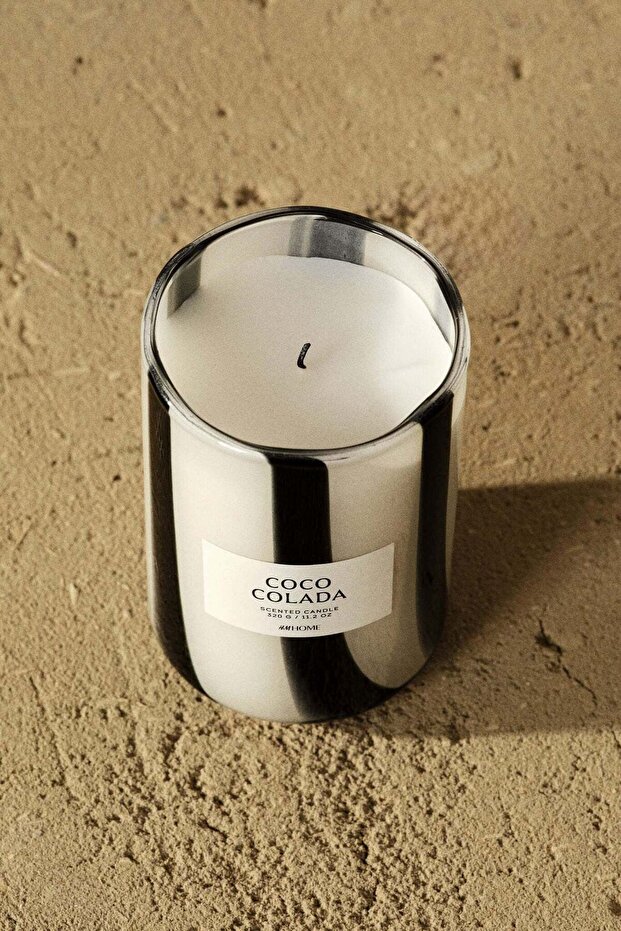 Scented candle in glass holder