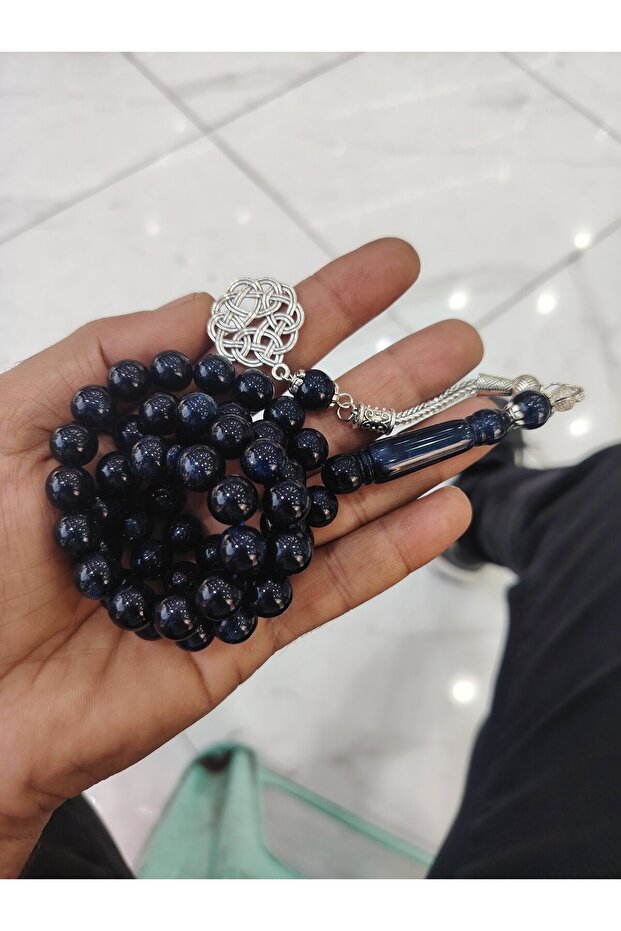مسبحة من الباكليت باللون الكحلي المرصع بالنجوم