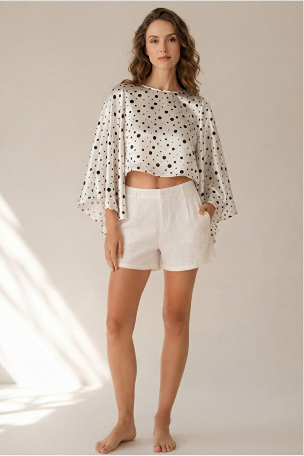 Black and White Polka Dot Asymmetrical Cut Unlined No Show Satin Cape Party Blouse