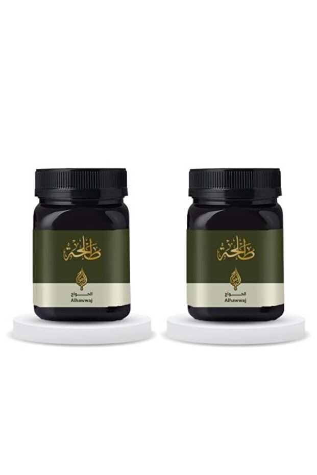 1 كجم من عسل التحل البلادي (حاويتان، كل حاوية نصف كيلو)