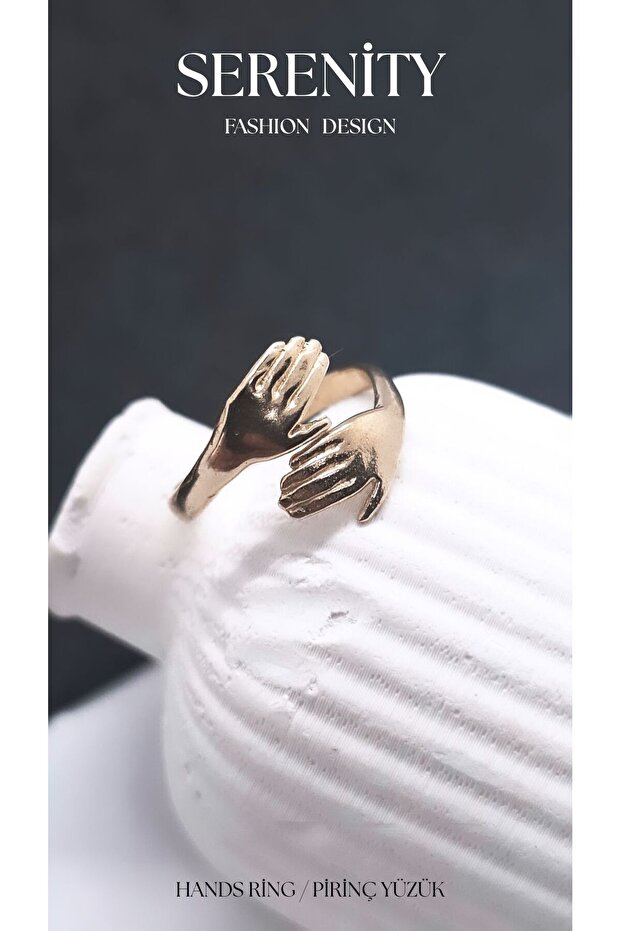 Brass Ring with Hand Figure Holding