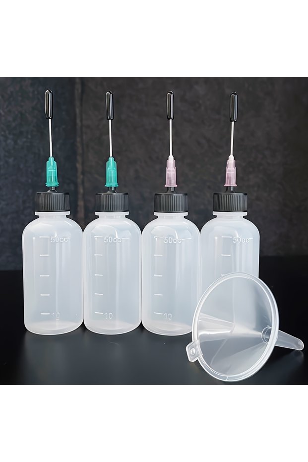 Mixed color suit 50ml plastic dispensing bottle with green and pink needle tip, black stopper.