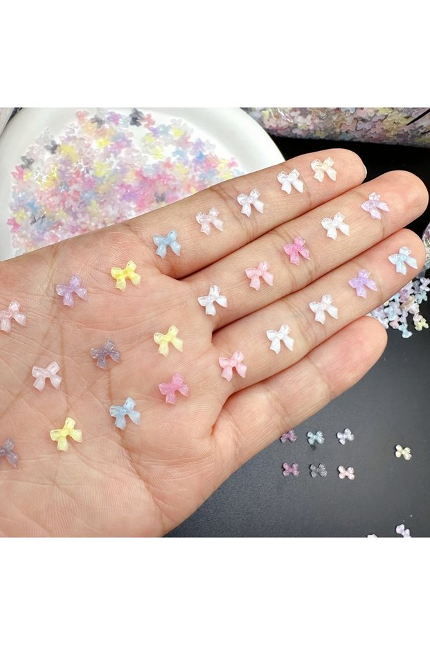 50pcs 50pcs Transparent Bow Nail Art Parts Charms Bulk Shiny Mini Resin Ribbon Nail Rhinestones DIY