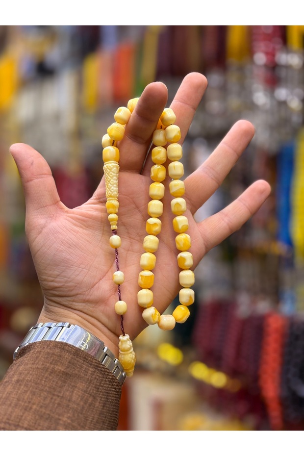 كبسولة صفراء اللون للاستخدام اليومي تسبيح