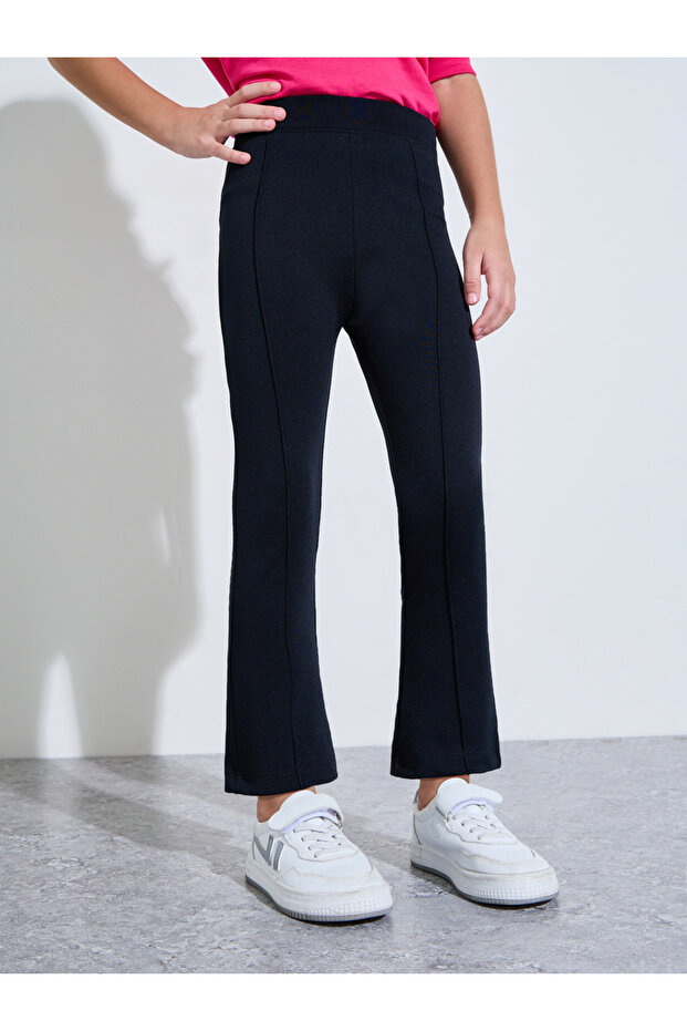 Girls Black Solid Fit and Flared Leggings with Pintuck Detail
