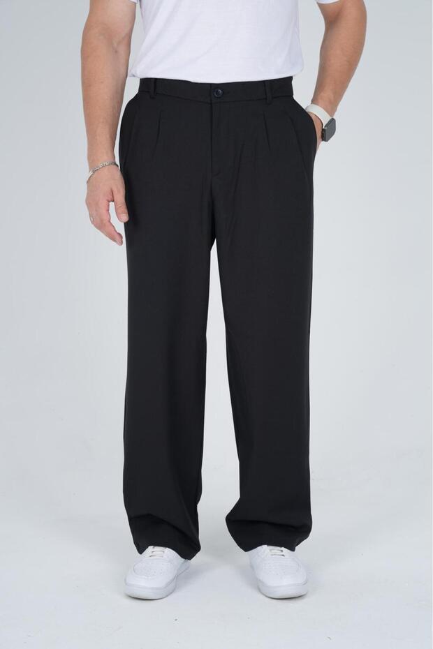 Pleated baggy fabric trousers