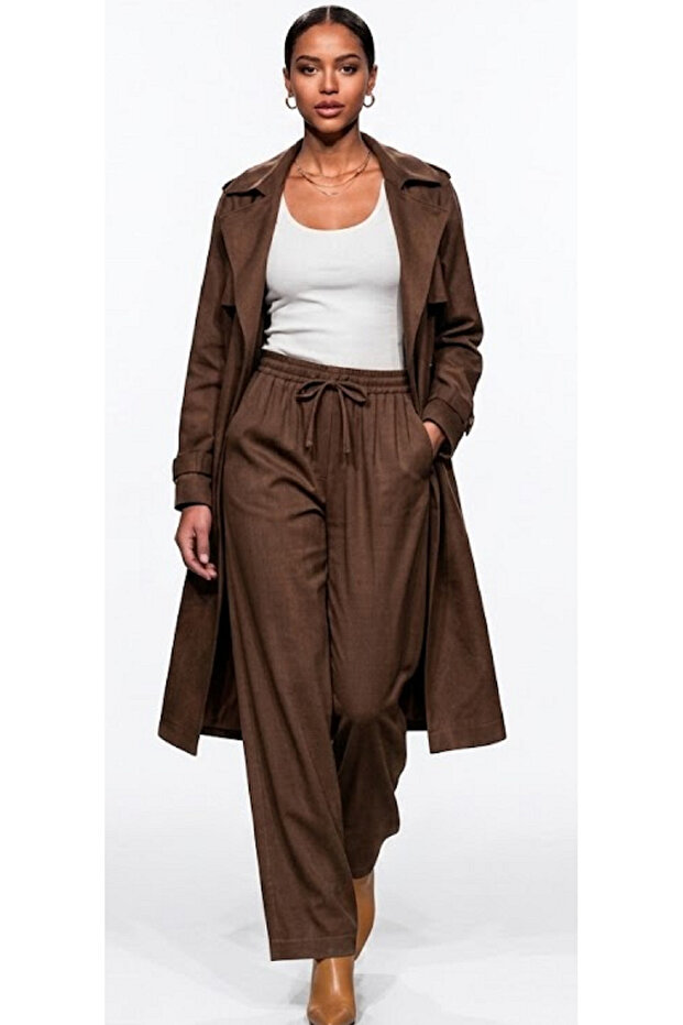 Elastic Waist Tensel Trousers: a Pair of Pants That Brings Elegance and All-Day Comfort with Their Wide Legs."
