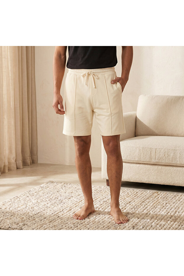 PLEATED KNIT SHORTS