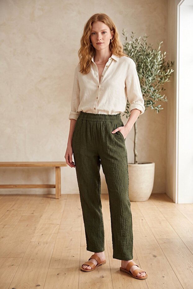 Black Elastic Waist Pocketed Bubble Textured Relaxed Fit Palazzo Trousers