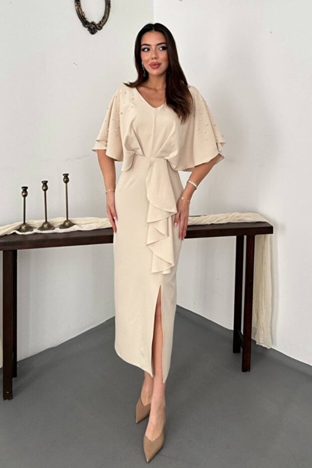 Beige dress with pearl cape