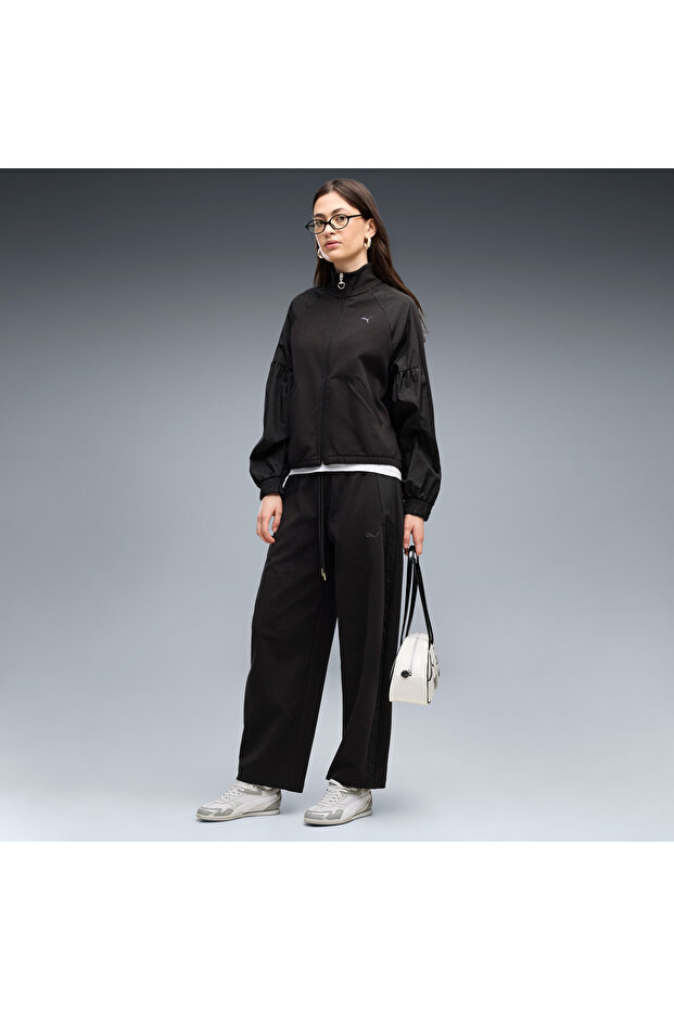 Her barrel leg trousers