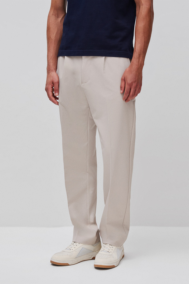 Men's beige elastic waist pleated trousers