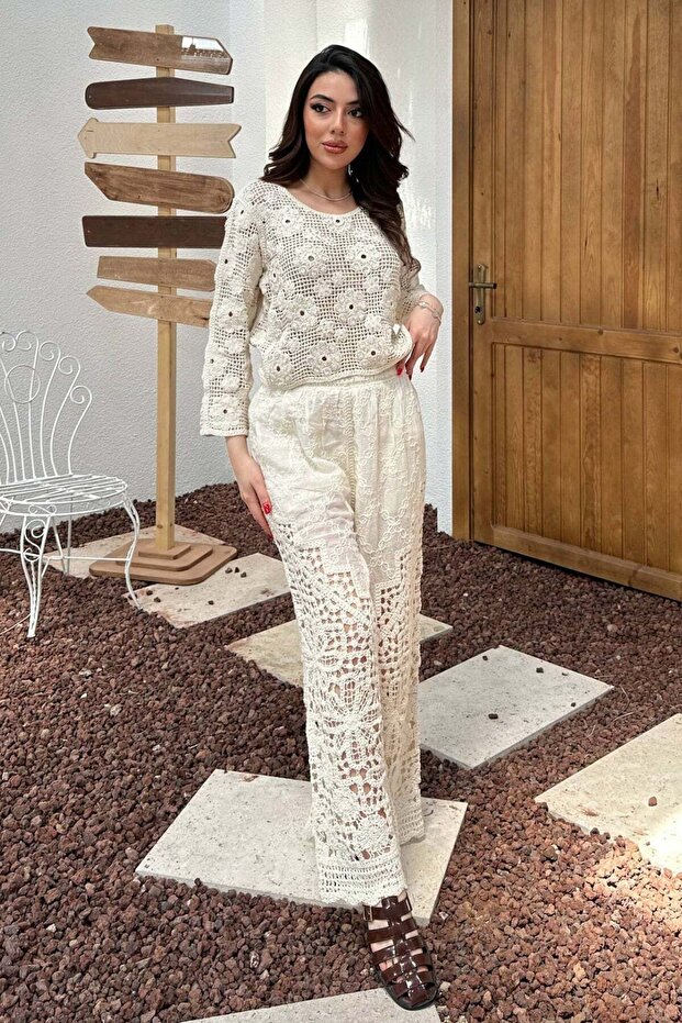 Ecru openwork knit blouse and pants set