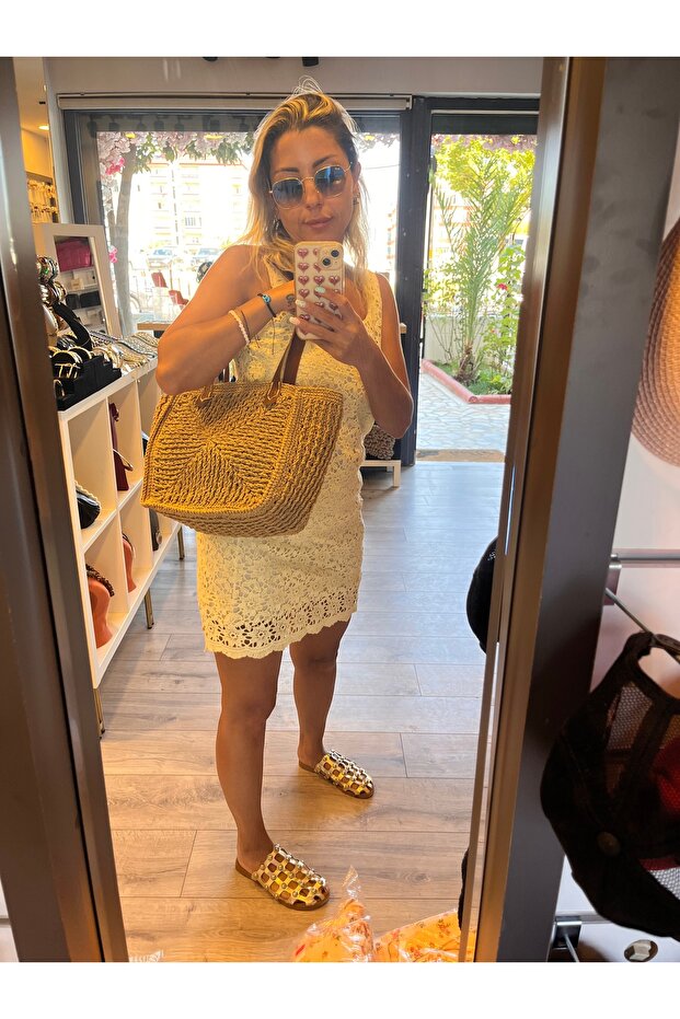 Hand knitted straw bag