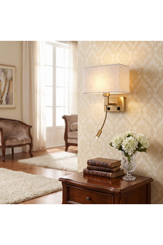 Gold Color Wall Lamp with Rectangular Fabric Shade and Flexible Reading Light.