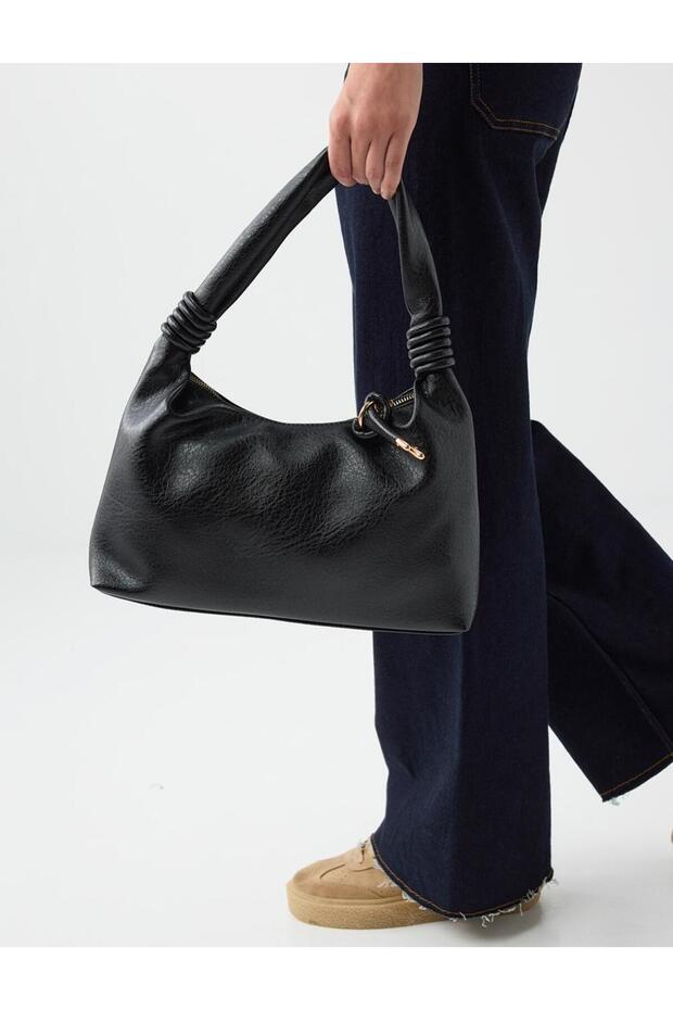 Black drawstring detailed hand and shoulder bag