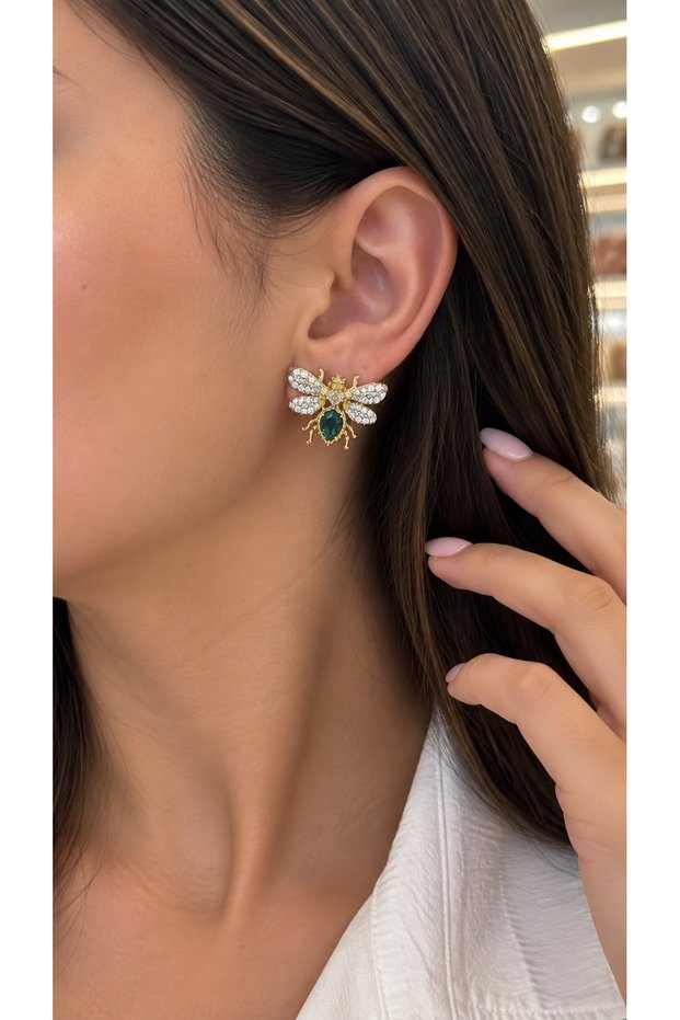 Women's Gold Earrings with Ari Figure and Sparkling Emerald Green Stones
