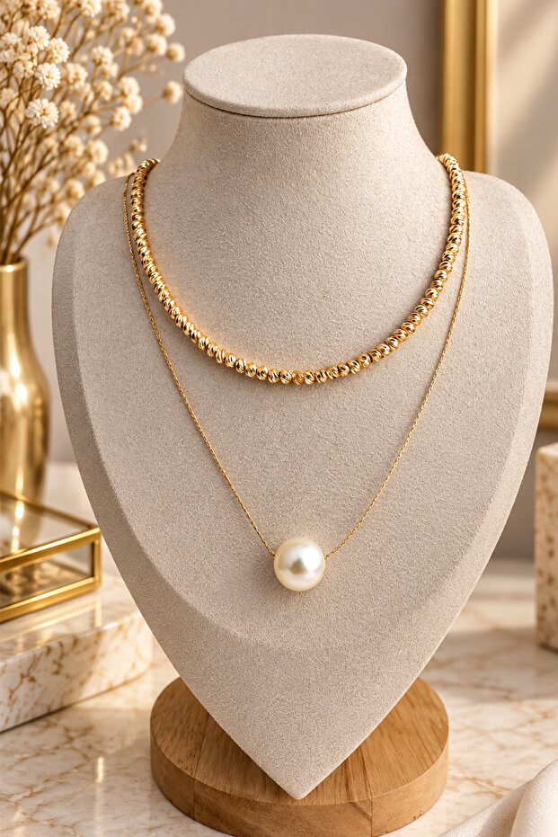 Golden dorika bead and pearl tipped double necklace