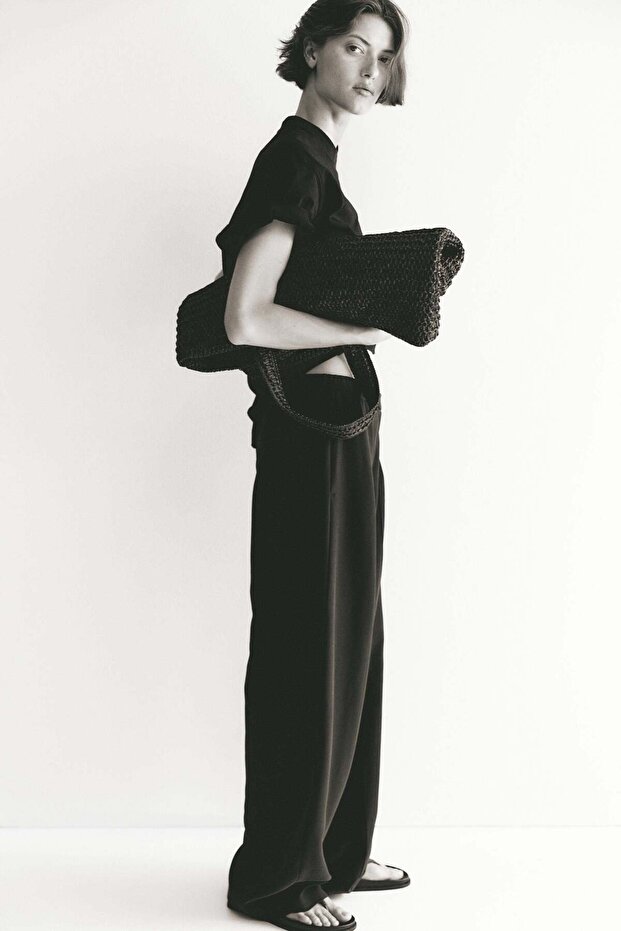 Crease-leg barrel trousers