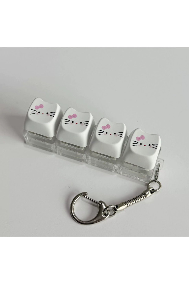 A Hello Kitty Kawaii Luminous Fidget Keychain Cute Cat Ear Keyboard Press Toy, Glow in Dark Stress R