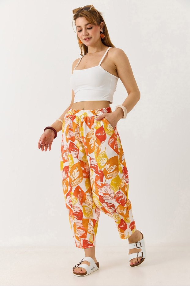 Orange Leaf Patterned Woven Fabric Comfortable Carrot Cut Trousers with Elastic Waist and Pockets
