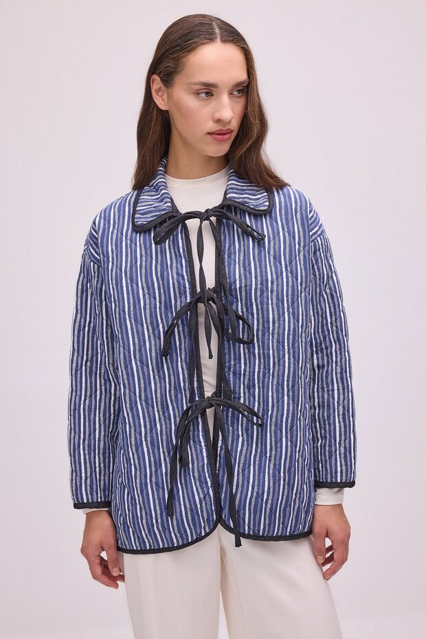 Buttoned quilted jacket