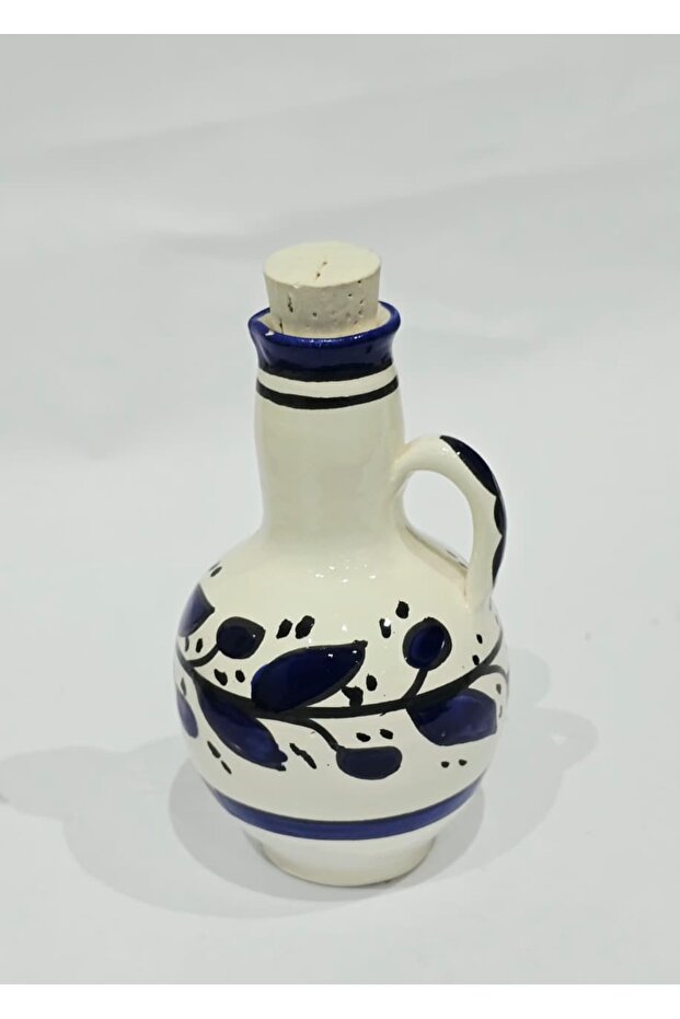 Small handmade ceramic oil pitcher