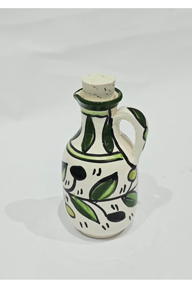 Small handmade ceramic oil pitcher