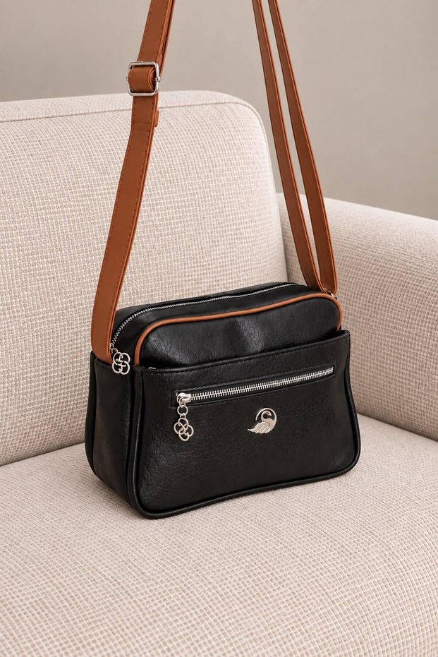 Women's Multi-Compartment Black-Tan Faux Leather Bag with Frame Detail and Shoulder and Crossbody Straps
